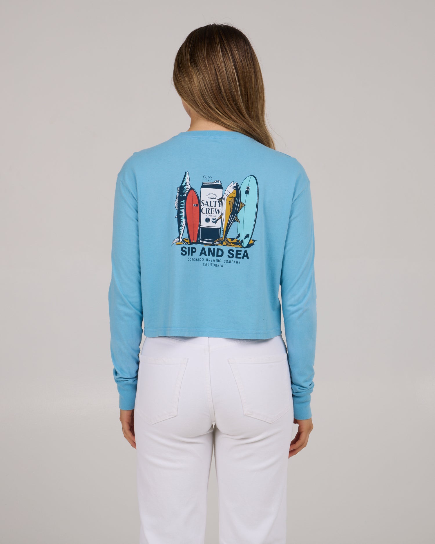 back view of Sip & Sea Long Sleeve Crop Tee - Lagoon Blue