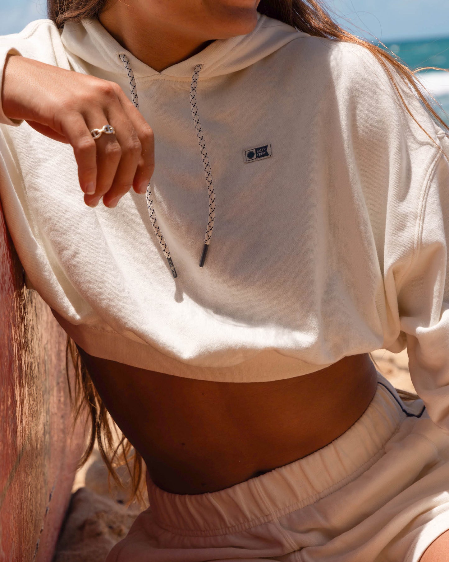 Lifestyle shot of the Catamaran Hoody - Off White. 