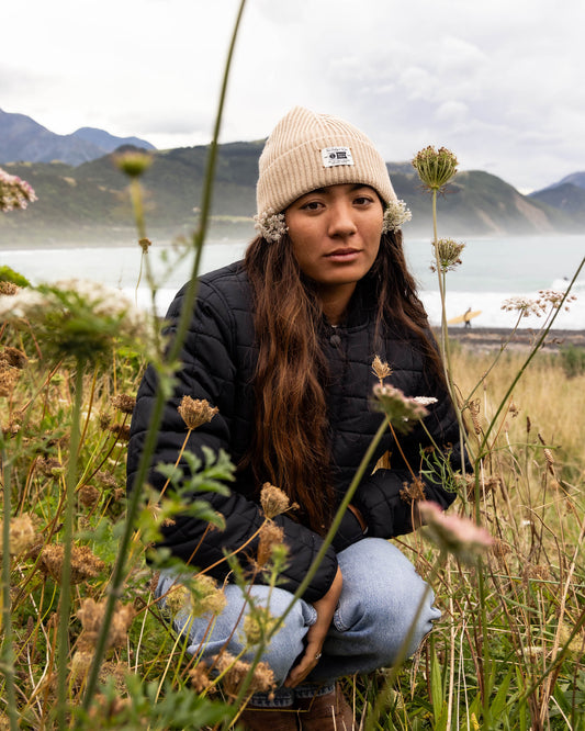 Lifestyle shot of the Seascape Beanie - Sand Dune. 