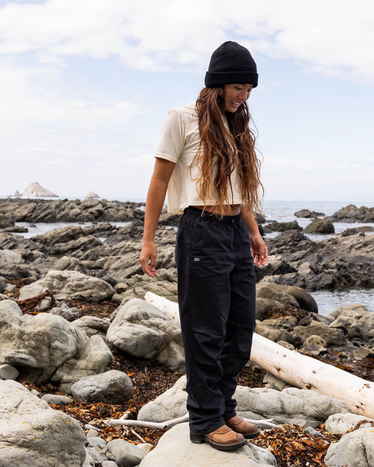 Lifestyle shot of the City Seas Pant - Black. 