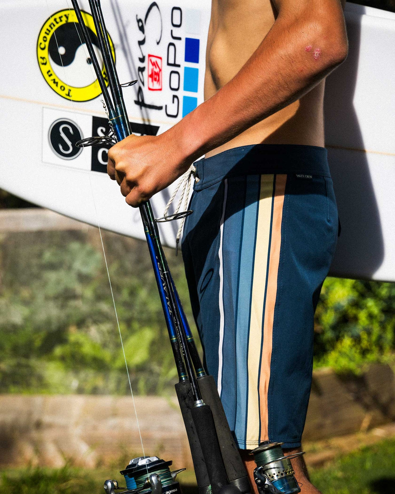 LIfestyle shot of the Sidebar Boardshort - Navy. 